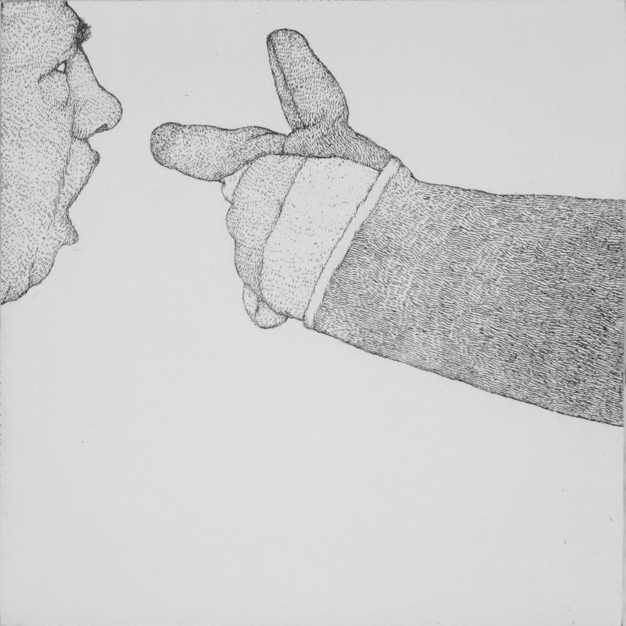 A Man Threatened by a Work Glove